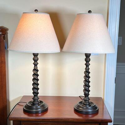PAIR TWISTED COLUMN LAMPS | Faux wood composition table lamps; overall h. 29 in.