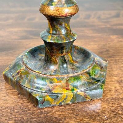 PAIR FAUX MARBLE CANDLESTICKS | Candle holders having marbled painted decoration, leather bases with Rinfret Home & Garden label; h. 11 in.