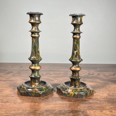PAIR FAUX MARBLE CANDLESTICKS | Candle holders having marbled painted decoration, leather bases with Rinfret Home & Garden label; h. 11 in.