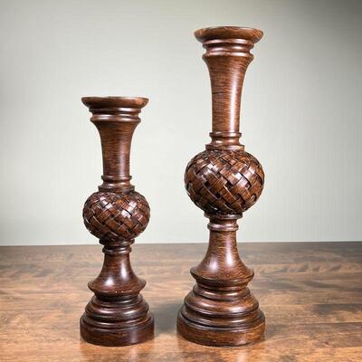 (2pc) VOTIVE HOLDERS | A pair of candle holders with basket weave pattern, painted composition in a wood style; tallest 18 in.