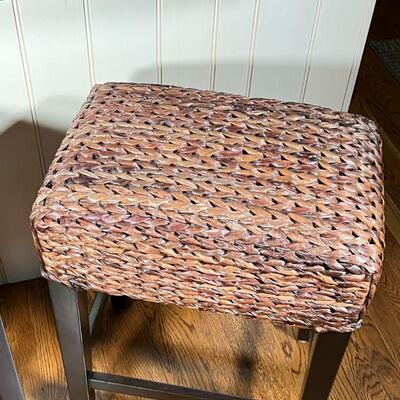PAIR WICKER TOP STOOLS | Counter-height bar stools with woven wicker style seats over dark wood tapering legs; h. 25 x 19 x 13 in.