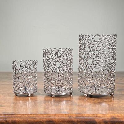 (3pc) CANDLE HOLDERS | Openwork metal votive / candle holders of contemporary design; largest h. 9-1/4 in.