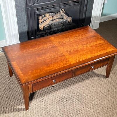 BASSETT COFFEE TABLE | By Bassett Furniture, a rectangular low table / cocktail table having a dark wood finish with two drawers over...