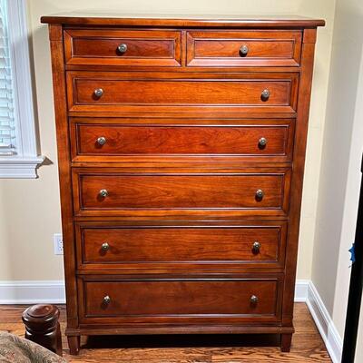 BASSETT FURNITURE TALL CHEST | By Bassett Furniture, tall dresser having two drawers over six full-width drawers, appearing in overall...