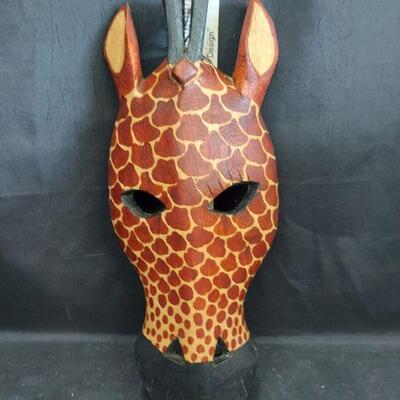 carved animal head mask
