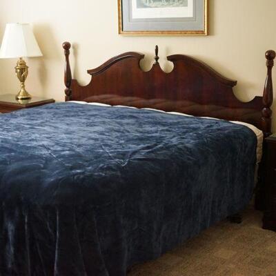 Thomasville King Size Bed set. To include bed, box spring and mattress, double dresser with mirror, Two nightstands. 