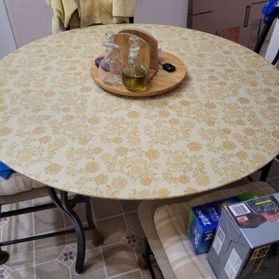 nook table, this picture has the cover on the table, it is a glass top table