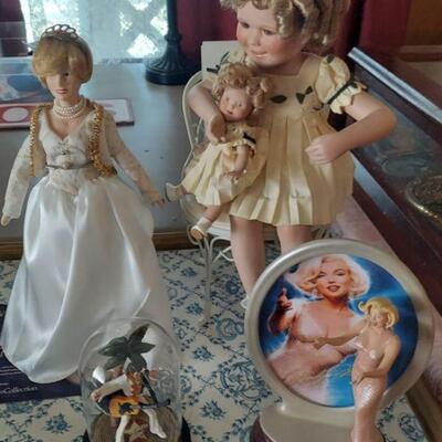 Shirley Temple & Princess Diana dolls.  ELVIS and Marilyn Monroe statues