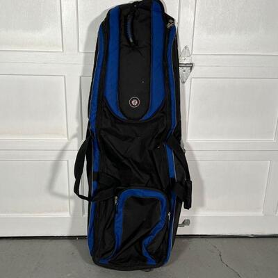 TRAVEL GOLF BAG | Black and blue rolling golf bag; approx. 51 x 19 in. [some wear, but in good and usable condition]