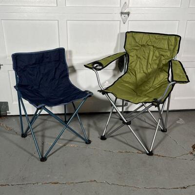 (2pc) CAMPING CHAIRS | Folding quad chairs in carrying cases, one black and one green; largest l. 35 in. (in bag)