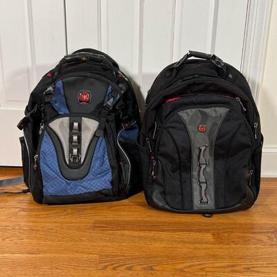 (2pc) WEGNER BACKPACKS | Including a black Wegner bag (h. 19 in.) and a blue SwissGear backpack