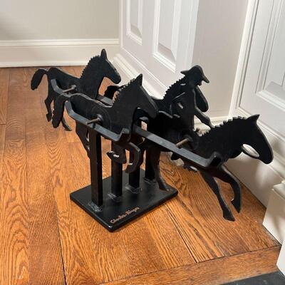 CHARLES RINGER HORSE SCULPTURE | Charles Ringer (American, b. 1948): kinetic sculpture, silhouette of a cowboy and four horses, signed on...