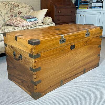 CAMPAIGN-STYLE BLANKET CHEST | Nicely figured wood, hinged lid chest with brass banding; h. 22 x w. 43-1/2 x d. 21-3/4 in.