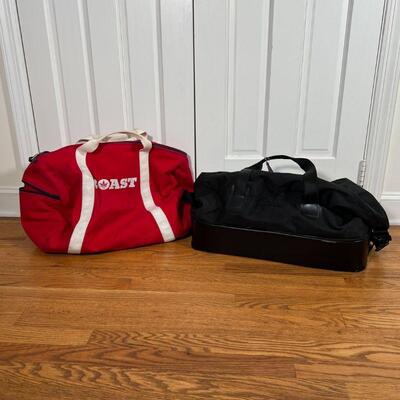 (2pc) ADDIDAS ETC. BAGS | Including a black Addidas duffle bag with lower hard shell compartment and a red Boast canvas bag; Addidas...