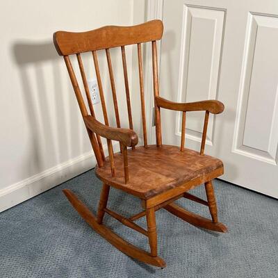 THAYER CHILD'S ROCKING CHAIR | Vintage oak spindle back rocking chair for kids, with Thayer label; h. 28 x w. 18-1/2 x d. 23-1/2 in.