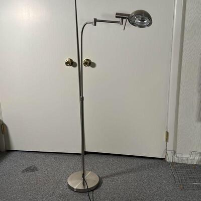 CHROME FLOOR LAMP | With articulating arm; overall h. 49-1/2 in., base dia. 10 in.