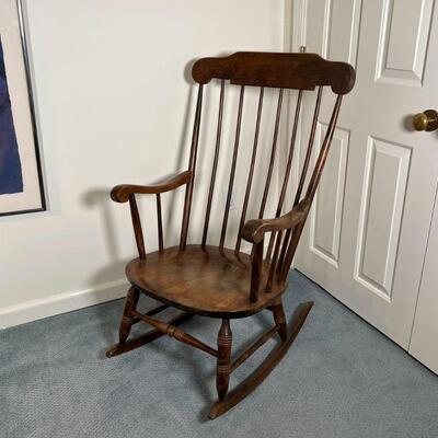 WOODEN ROCKING CHAIR | Solid wood spindle back rocking chair with scrolled arms; h. 40 x w. 24-3/4 x d. 28-1/4 in.