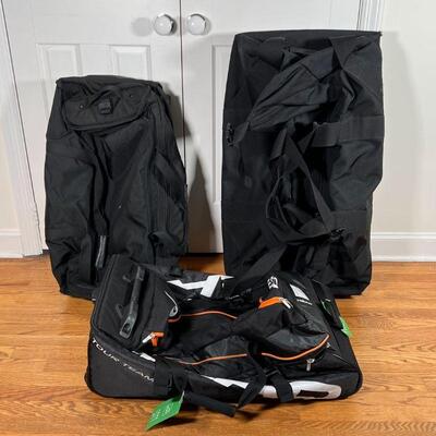 (3pc) HEAD & LL BEAN BAGS | Including a Head Tour Team rolling sports bags, a large LL Bean rolling bag (l. 34 in.), and an unmarked...