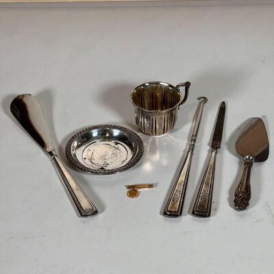 (7pc) STERLING & GOLD | Including a 14k gold pin, 4 Alvin sterling handled flatware, a small sterling silver dish (dia. 3-1/4 in.), and a...