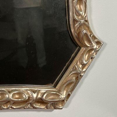 ANTIQUED WALL MIRROR | Large wall mirror, having a gold mottled mirror surface in a gilt / silvered carved frame