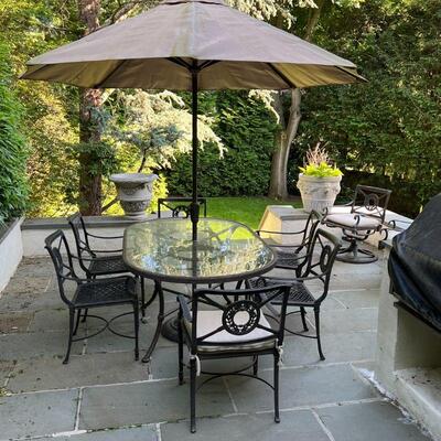 (8pc) PATIO DINING SUITE | Cast Classics Landgrave patio furniture set, cast aluminum, including an oval shaped glass top dining table...