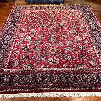 AREA CARPET | Room size carpet with an overall field of floral pattern on a red ground; 10 ft. x 7 ft. 11 in.