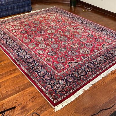 AREA CARPET | Room size carpet with an overall field of floral pattern on a red ground; 10 ft. x 7 ft. 11 in.