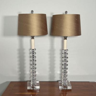 PAIR FANCY TABLE LAMPS | Heavy glass or rock crystal column table lamps with gold fabric shades; overall h. 23 x dia. 9 in., base 4 x 4 in.