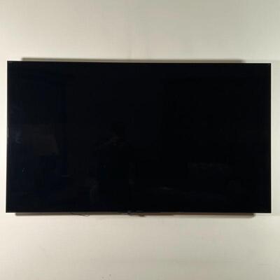 SONY 64 IN. TV | Large flat screen TV, wall mounted, with stands to sit on a flat surface (not pictured)- tested and works!