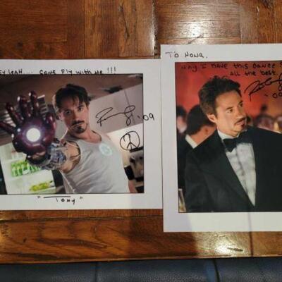 #1122 â€¢ (2) Signed Robert Downey Jr. Photos. Autographs have not been authenticated. 