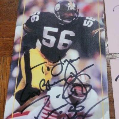 #1064 â€¢ Signed Pittsburgh Steelers Photo and 2 Autographs player signatures unknown 