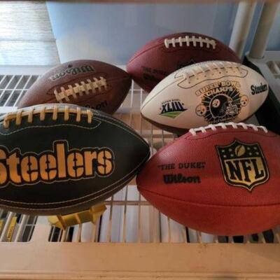 1068 â€¢ (5) NFL Footballs: Includes Wilson and Steelers footballs