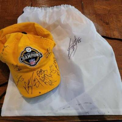 #1062 â€¢ Signed Pittsburgh Steelers Hat and Cinch Backpack signatures unknown. 