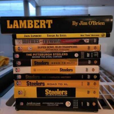 #1070 â€¢ (9) Steelers DVDs and (2) Steelers Books, Includes single DVD and multiple DVD sets.