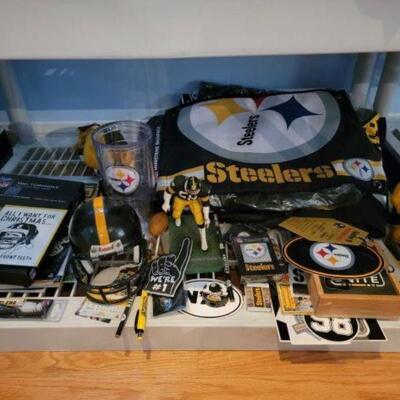 #1074 â€¢ Various Pieces of Steelers Merchandise: Includes mini cornhole, cups, mini helmet and more.