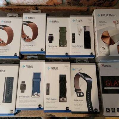 1214 â€¢ (10) Fitbit Accessories: Includes bands, headphones and more