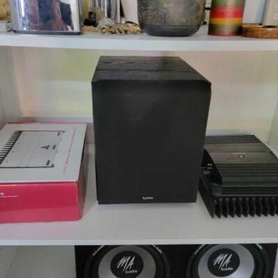#2138 â€¢ Amplifiers And Speaker: Brands Include Alpine, JL Audio, And Infinity. 