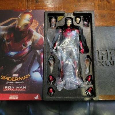 #1084 â€¢ Hot Toys Iron Man Mark XLVII 1/6th Scale Figure from Spiderman: Homecoming. Figure is new in box.