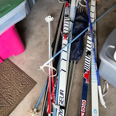 Skis, boots as well. Inquire for size. 