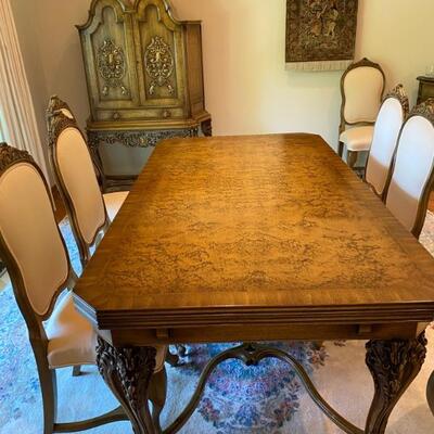 Antique Dining Table Each End Pull Out Leaves. Wood is Magnificent! Serpentine Carved 8 Side Chairs with White Silk Fabric, 2 Arm Chairs....