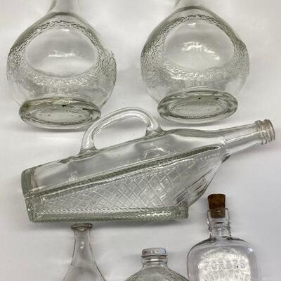 235. Assorted Vintage Glass Bottles including Martinellis and Forbes Jack Rose Rye whiskey