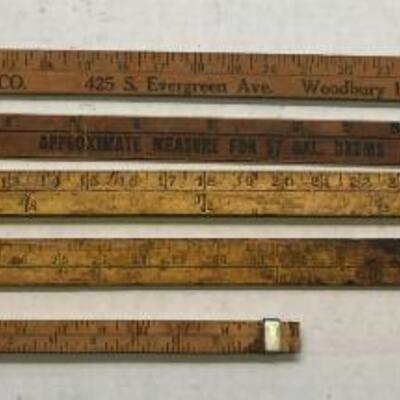 415. Lot of Vintage Wooden Yard Sticks