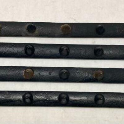 411. Three Vintage Cast Iron Metal Hanging Racks