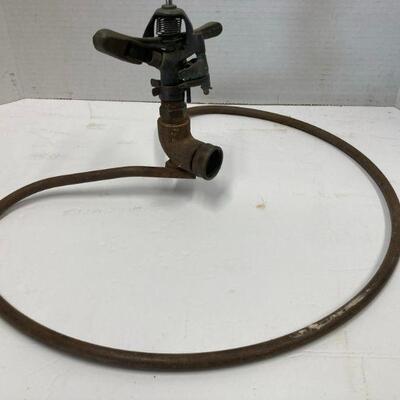 537. Vintage Osculating Yard Sprinkler