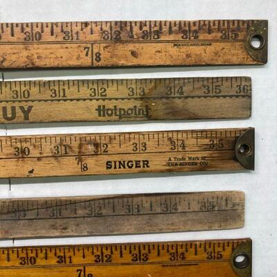 416. Lot of Vintage Wooden Yard Sticks Including Singer, Westcott, and Hotpoint