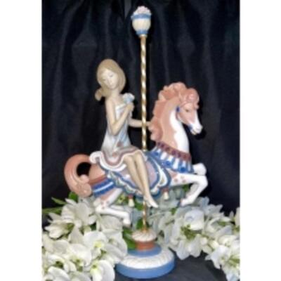 Exquisitely Detailed And RARE COLLECTIBLE By LLADRO Entitled "GIRL ON CAROUSEL" 