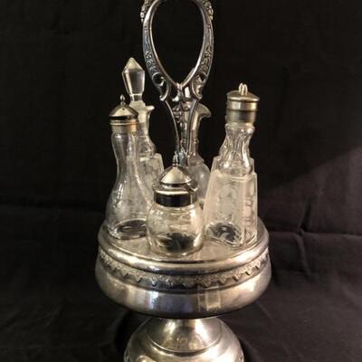 Vintage Condiments Set on Chrome Stand has:
Shakers & Cruets in all sizes...
