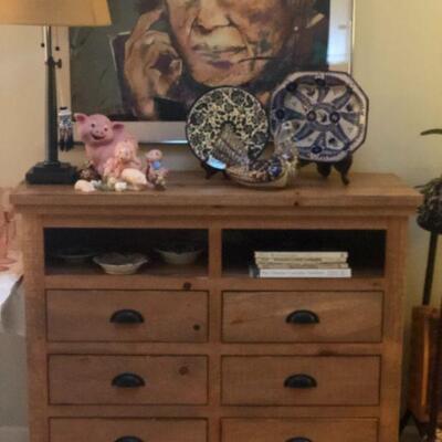 Pine Sideboard/Chest (49.5in H x 48.5in L x 18in D), Pottery, Pig Collection, Lamp, Framed Art, Gardening Books.