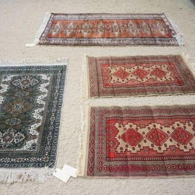 1299	LOT OF 4 PERSIAN THROW RUGS, LARGEST IS 6 FT X 3 FT 2 IN

