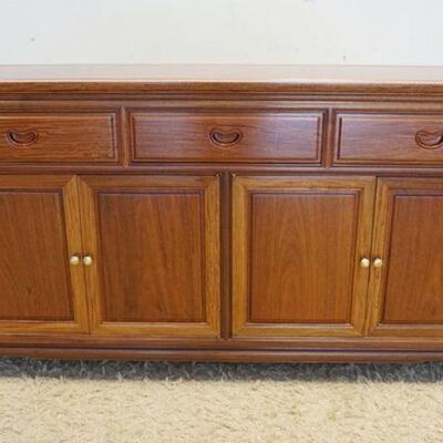 1042	ROSEWOOD ASIAN SIDEBOARD HAVING 3 DRAWERS & 4 DOORS APPROXIMATELY 60 IN X 19 IN X 33 IN HIGH
